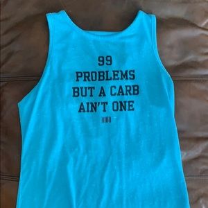 Victoria’s Secret muscle tank.